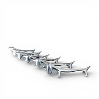 Vintage dachshund-shaped knife rest in original box