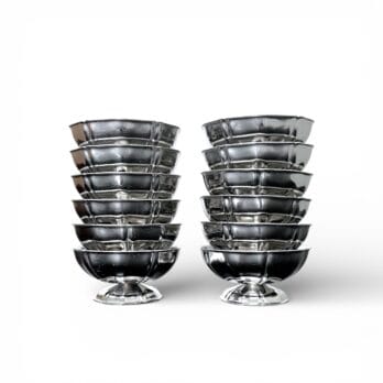 Set of 12 rimmed and grooved steel cups